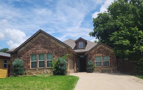 Front of the home. Fully fenced in on the sides and back of the home. 