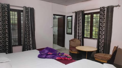 Family Triple Room, Balcony, Mountain View | Desk, laptop workspace