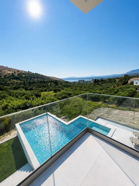 
Enjoy panoramic views from your private balcony overlooking the infinity pool and bay.