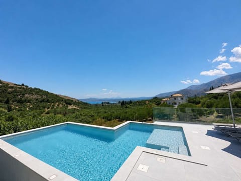 Cool off in your private infinity pool while enjoying uninterrupted views of Crete's countryside.