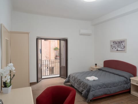 Deluxe Quadruple Room, Balcony | Free WiFi