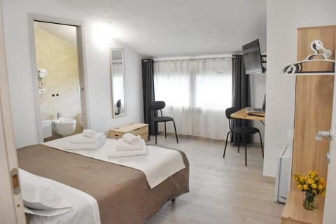 Classic Double or Twin Room, Garden View | Desk, laptop workspace, blackout drapes, iron/ironing board