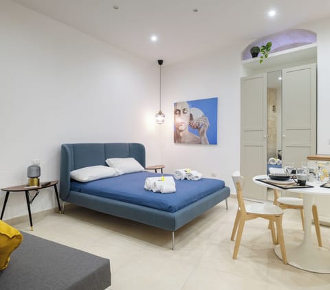 Deluxe Room, Park View | In-room safe, desk, laptop workspace, iron/ironing board