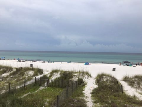 View from the deck; less than 50 yards to white sandy beach; less crowded and more private.
