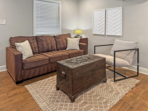 Cozy living room with plush seating and a rustic trunk coffee table