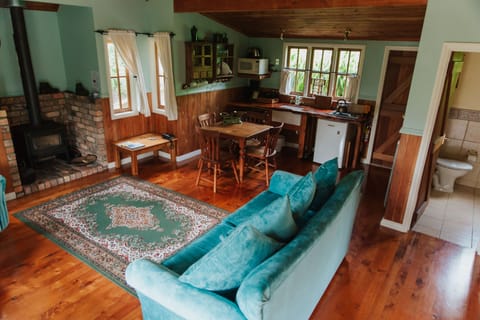 Romantic Cottage | Living area | 32-inch LCD TV with digital channels, TV, fireplace