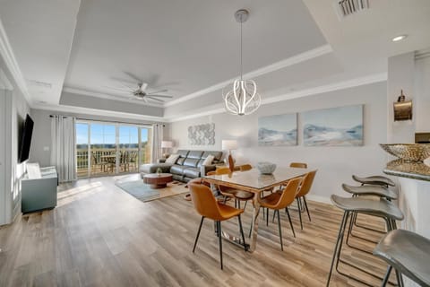 Six-seat dining table with golf course backdrop
