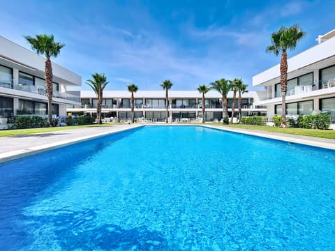 Modern ground floor apartment at Antilia Terraces in Mar de Cristal with large private terrace overlooking the pool and gardens.