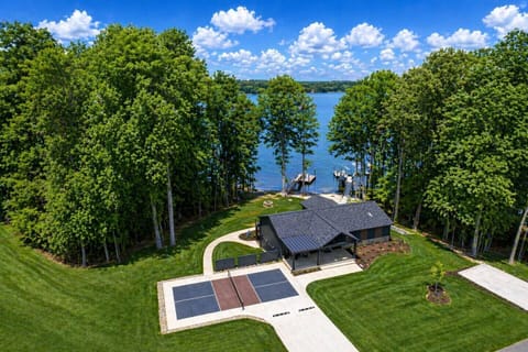 Aerial view of the property - private dock, sandy beach, and Lake Norman right in your backyard