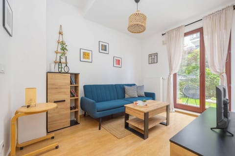 Bright Living Room with Comfortable Sofa and Direct Access to the Garden Terrace
