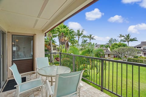 Sip your morning coffee on your private balcony overlooking lush tropical gardens and swaying palms—the perfect spot to unwind and soak in island serenity.