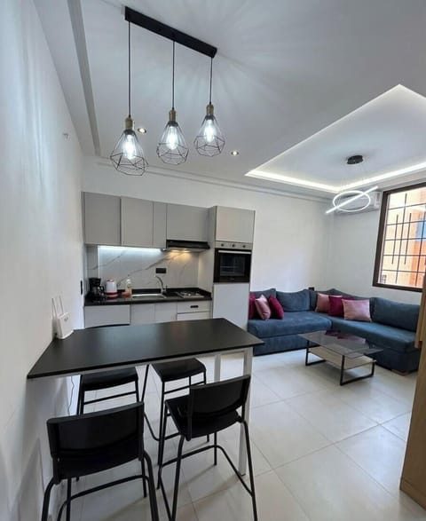 Deluxe Studio, City View | Living area | 45-inch Smart TV with digital channels