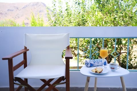Balcony Breakfast Table with Garden Views