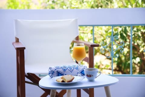 Bright Balcony Dining Area with Garden Views
