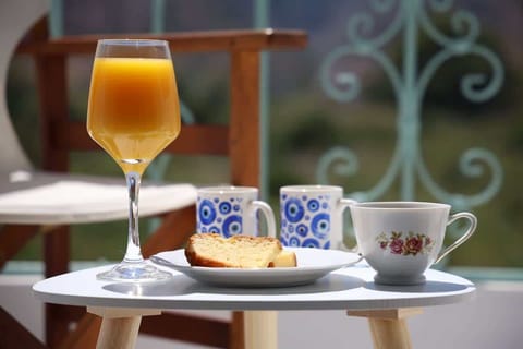 Welcome Refreshments and Breakfast at the balcony of the property