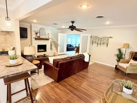 Double French doors in the living room lead to the game room.