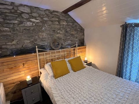 Bedroom, beams, stone and theme lighting