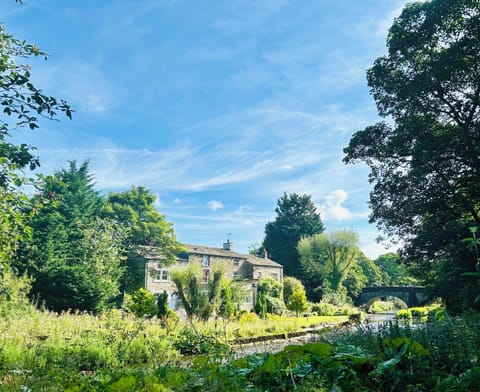 River House across the River Aire from High Green.