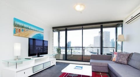 Comfort Apartment, Balcony | Living area | 50-inch Smart TV with digital channels
