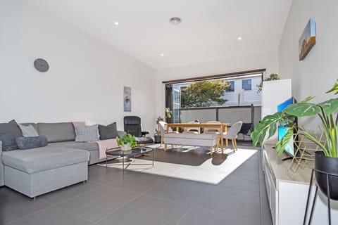 Bright open-plan living with patio access and stylish modern comforts