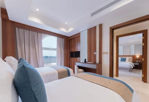 Grand Suite, City View | In-room safe, iron/ironing board (on request), WiFi (free), bed sheets