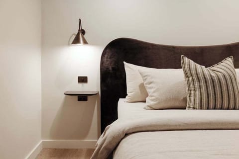 Quiet bedroom details designed for slower mornings.