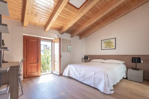 Superior Double Room, Garden View | In-room safe, desk, soundproofing, iron/ironing board