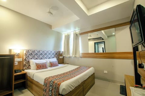 Executive Double Room, City View | Laptop workspace, iron/ironing board, free WiFi