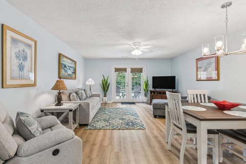 The dining and living space has ample seating for the whole family for movie nights!