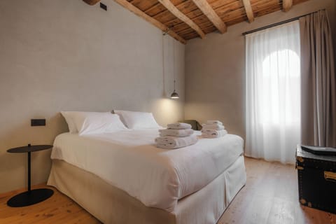 Double Room, Courtyard View | Hypo-allergenic bedding available, blackout drapes, soundproofing
