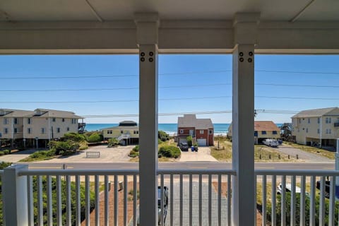 Balcony view overlooking the neighborhood and coast.