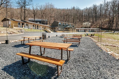 Gather around the picnic tables for casual meals and evening chats under warm strings of lights.