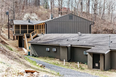 Charming lodge exterior nestled among the trees on Afton Mountain.