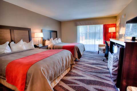 Desk, laptop workspace, blackout drapes, iron/ironing board