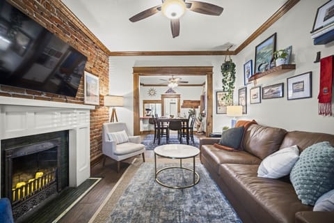 Cozy living room with smart TV and artistic touches throughout