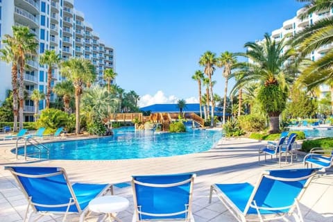 Destin's largest lagoon pool with waterfalls and resort-style lounging