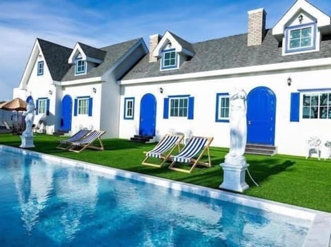 Deluxe Quadruple Room, Balcony, Courtyard View | Pool | Outdoor pool