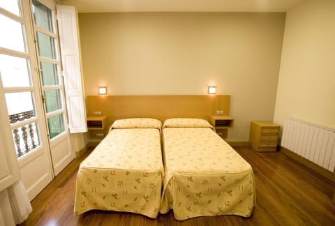 Double or Twin Room | Down comforters, free WiFi, bed sheets