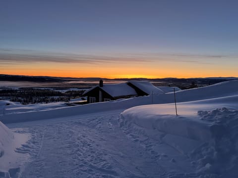 Sunset cabin view from ski slope