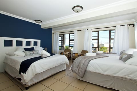 Family Quadruple Room, Multiple Beds, Non Smoking, Garden View | Premium bedding, down comforters, pillowtop beds, desk