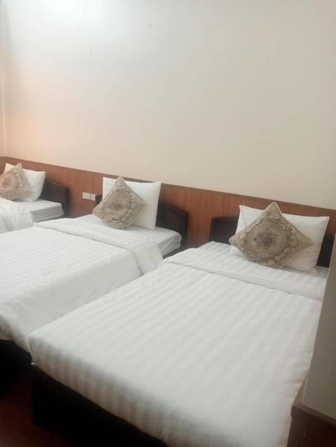 Deluxe Triple Room, Balcony, Garden View | Soundproofing, WiFi (free)