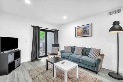 Enjoy your favorite shows and movies, or unwind in the roomy living area featuring comfortable seating and a large, streaming-ready widescreen TV.