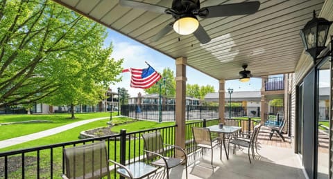 Poolside VIP patio and deck area, with pool in background.