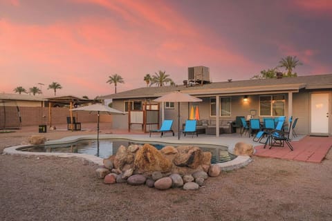 Large, fully fenced backyard with beautiful sunsets