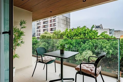 Morning coffee with a green city view
