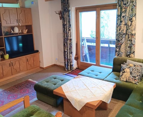 Comfort Apartment, 2 Bedrooms, Balcony, Mountain View | Living area | 50-inch flat-screen TV with cable channels