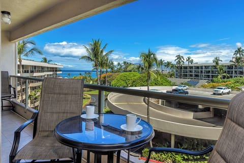 Picture yourself sipping morning coffee on your private lanai, where swaying palms frame stunning ocean views and tropical breezes invite you to unwind in paradise.