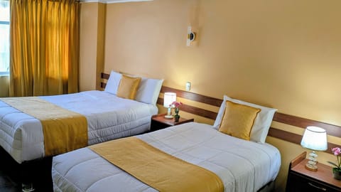 Desk, laptop workspace, free WiFi, bed sheets