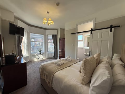 Deluxe Room, Bay View | Blackout drapes, iron/ironing board, travel crib, WiFi (free)