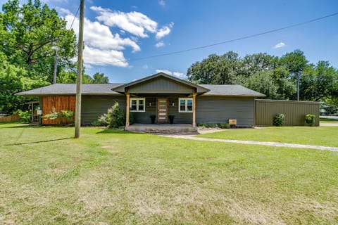 Spacious front yard with covered parking for added convenience during your stay.
